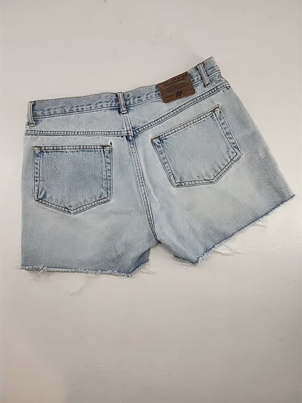 American Eagle Dungarees Size 10R | High Rise Distressed Denim Jean Shorts - Picture 4 of 4